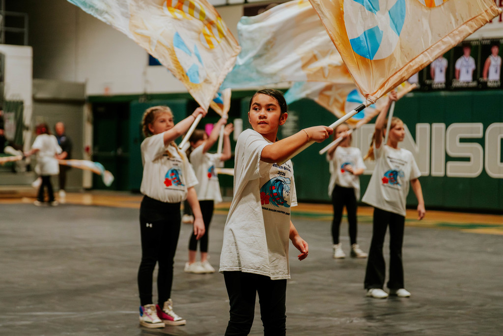 Elementary student with flag