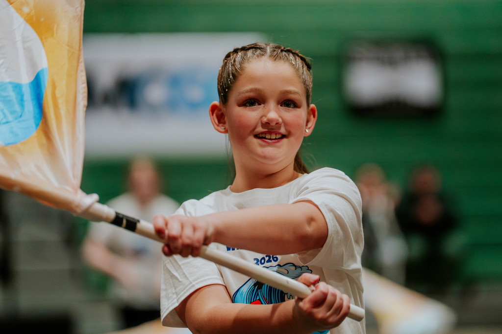 Elementary student with flag