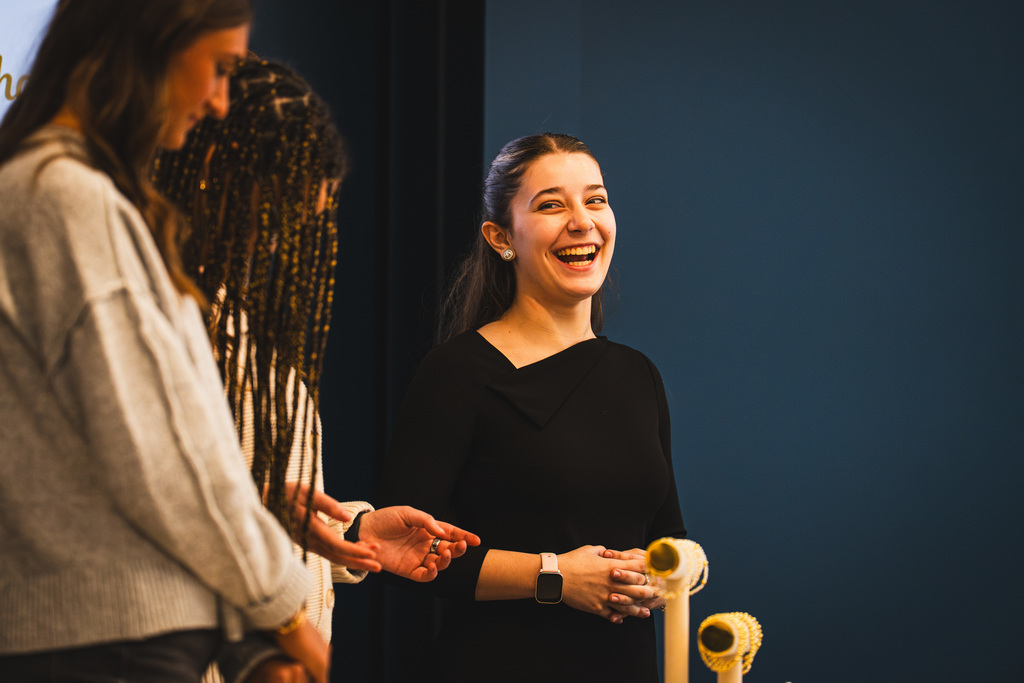 Student smiling during presentation