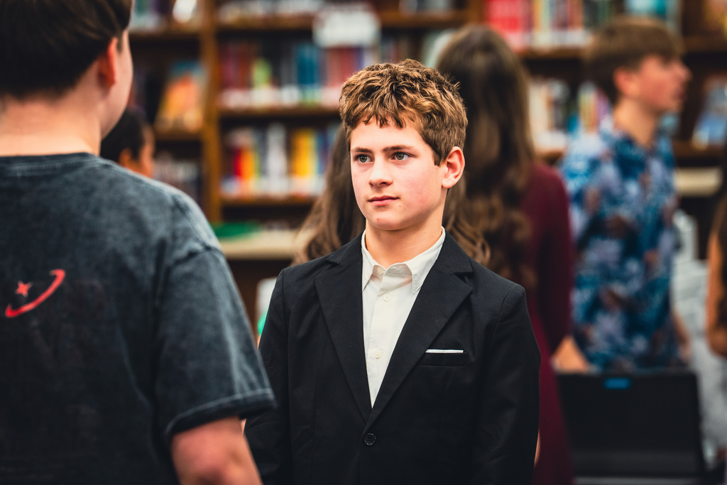 Student listens at career fair