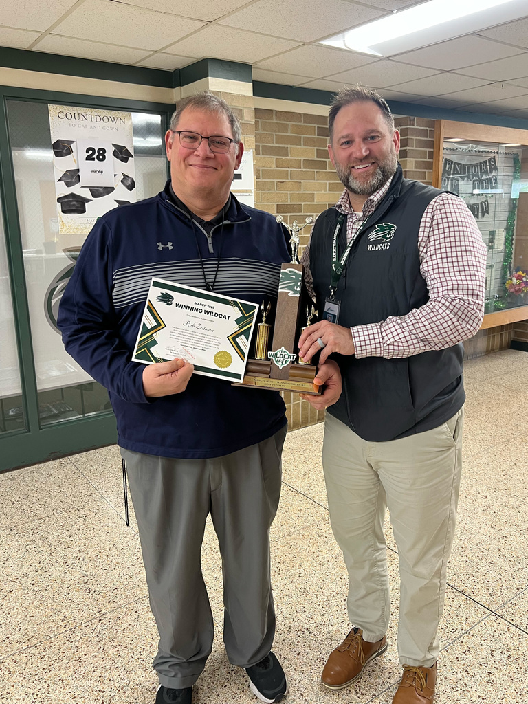 Principal with winning teacher