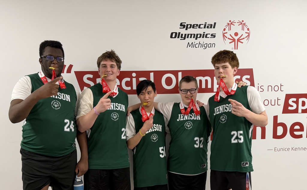 Unified basketball team with their medals