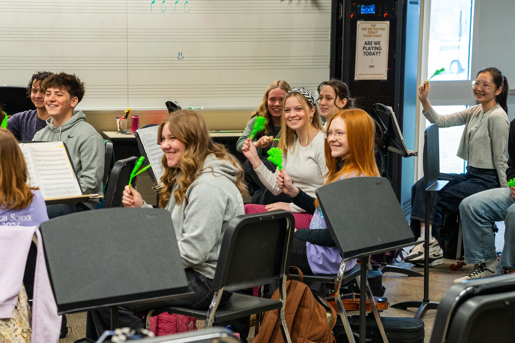 Students cheering on Dan Scott