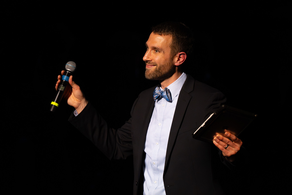 Choir director smiling