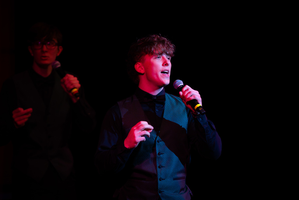 Male choir member singing solo