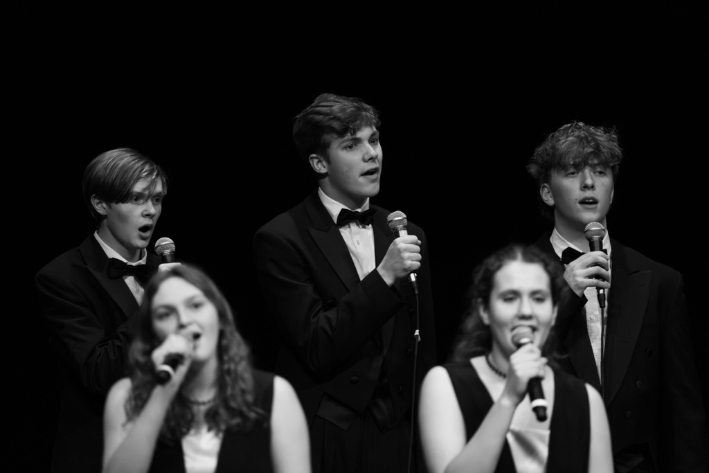 Choir member singing as a group