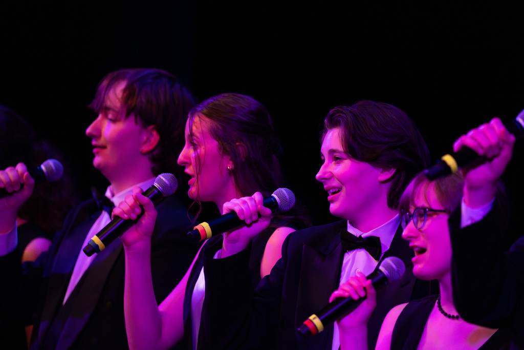Group of choir members singing
