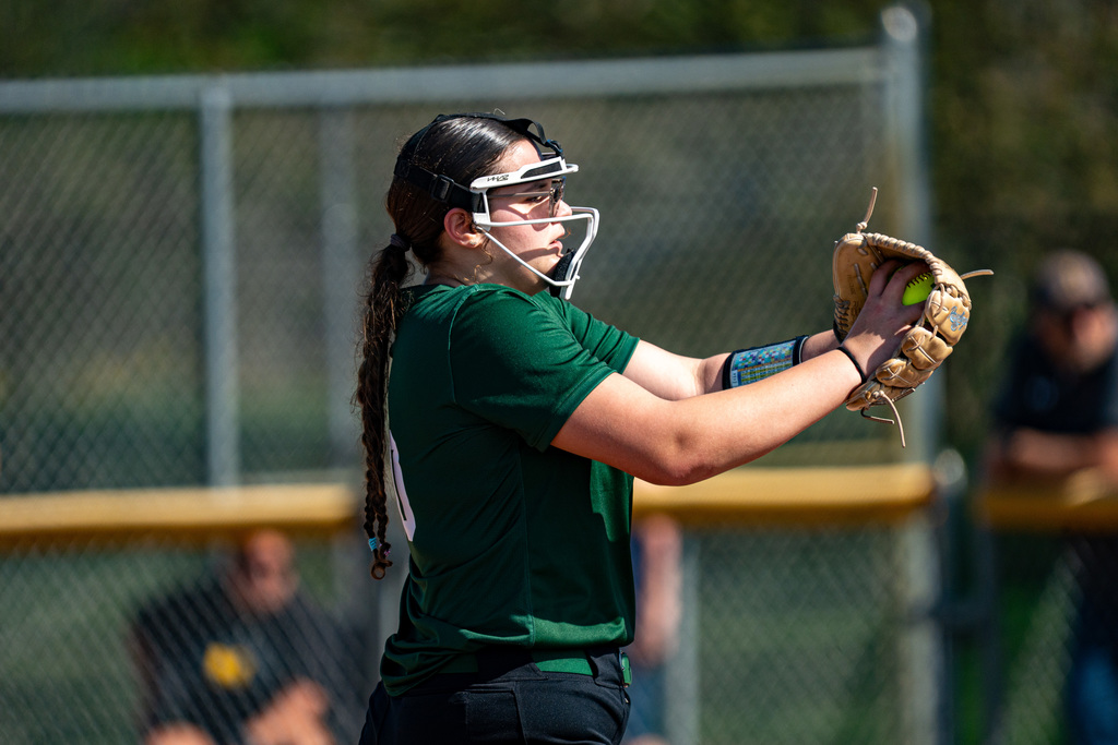 Softball pitcher pitching