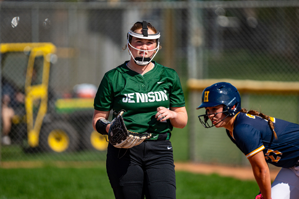 Softball player guarding first base