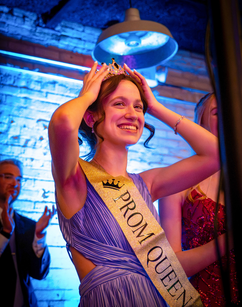 Prom queen holding crown