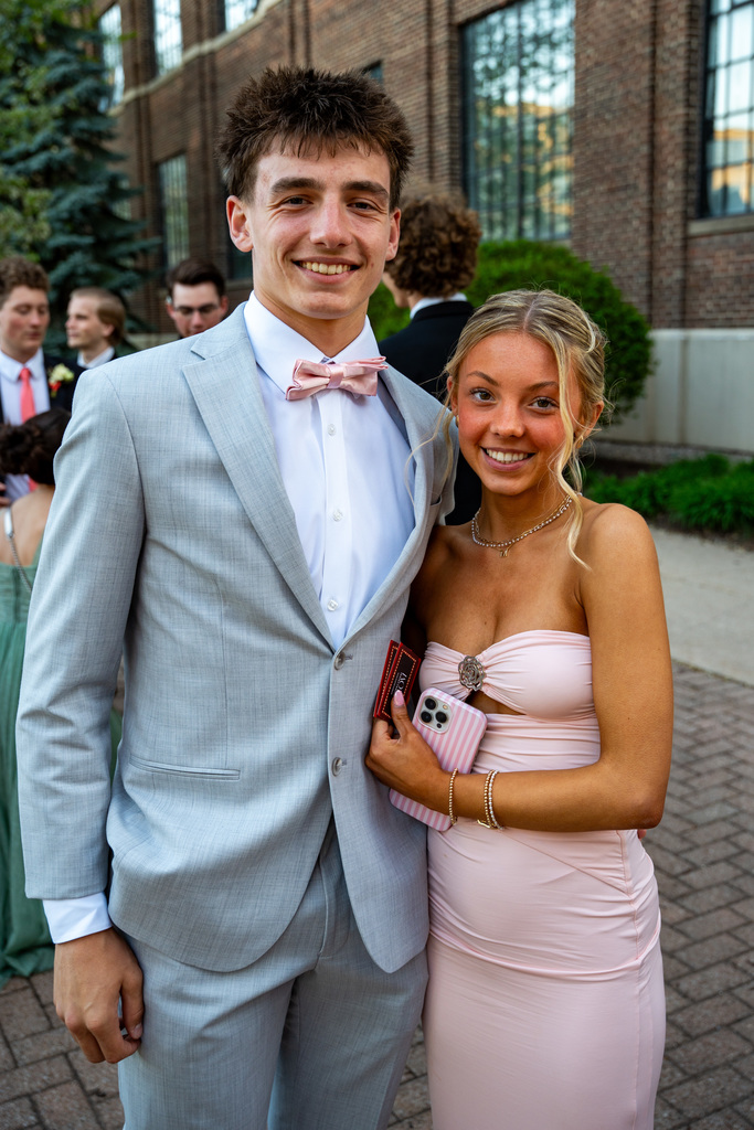 Students posing outside prom