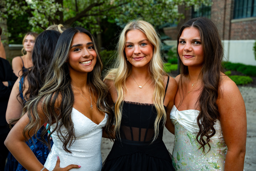 Students posing outside of prom