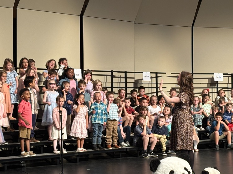 Mrs. Willie leading K in a song 