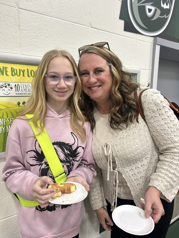 families enjoying the Donuts with a Grown Up Event