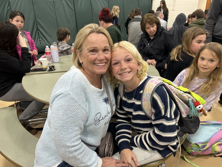 families enjoying the Donuts with a Grown Up Event