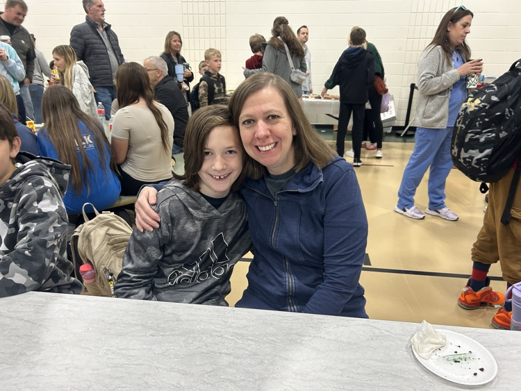 families enjoying the Donuts with a Grown Up Event
