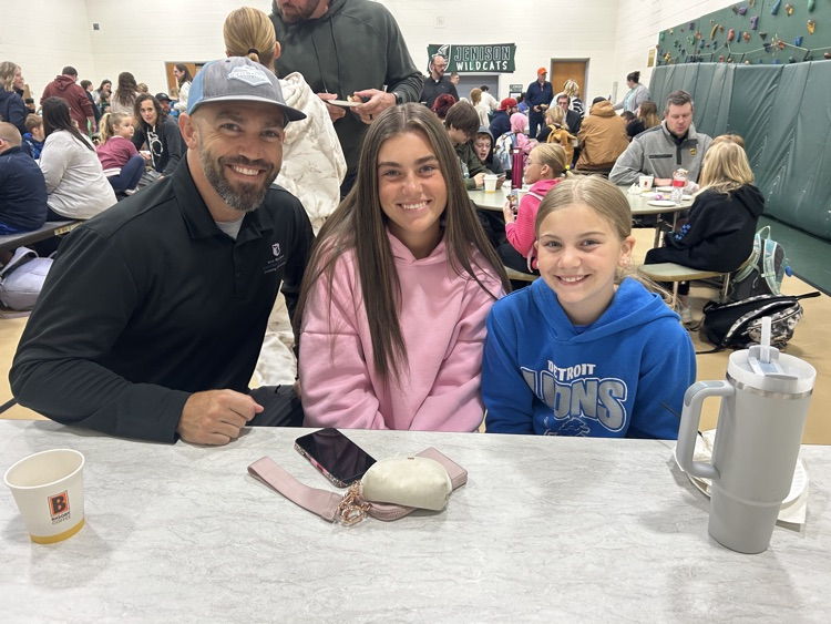 families enjoying the Donuts with a Grown Up Event