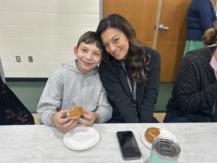 families enjoying the Donuts with a Grown Up Event