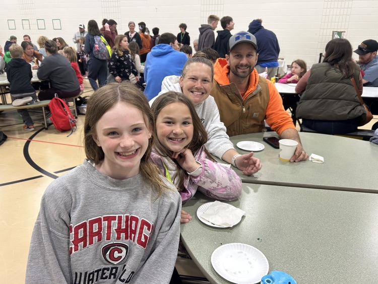families enjoying the Donuts with a Grown Up Event