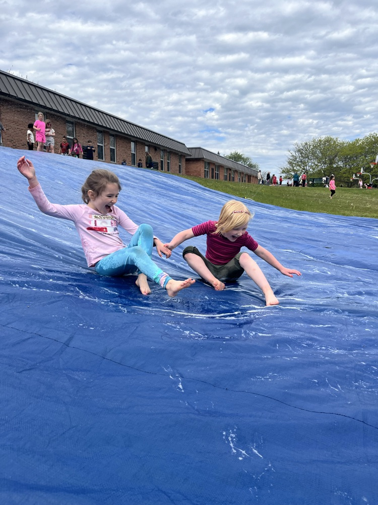 students on slip n slide