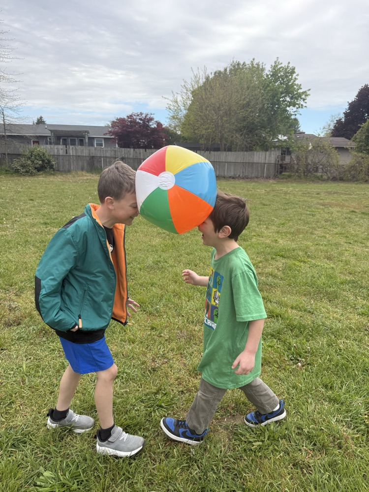 students playing field day game