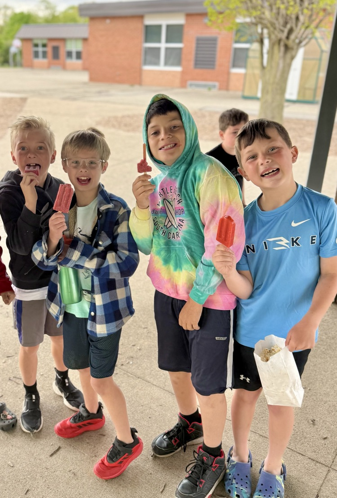 students with popsicles