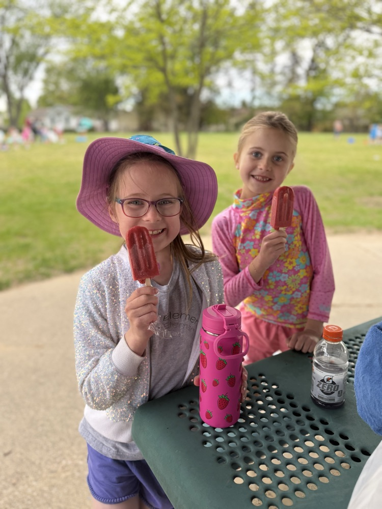 students enjoying popsicles