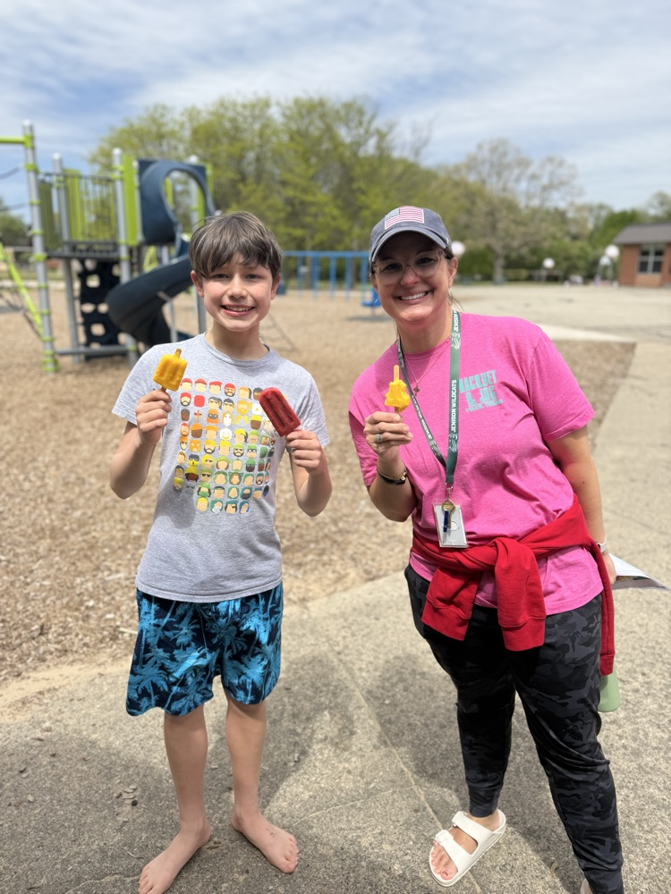 teacher and student smiling