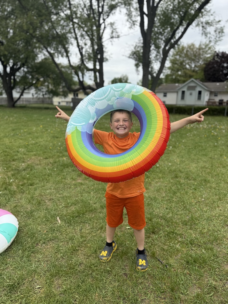 student in inner tube