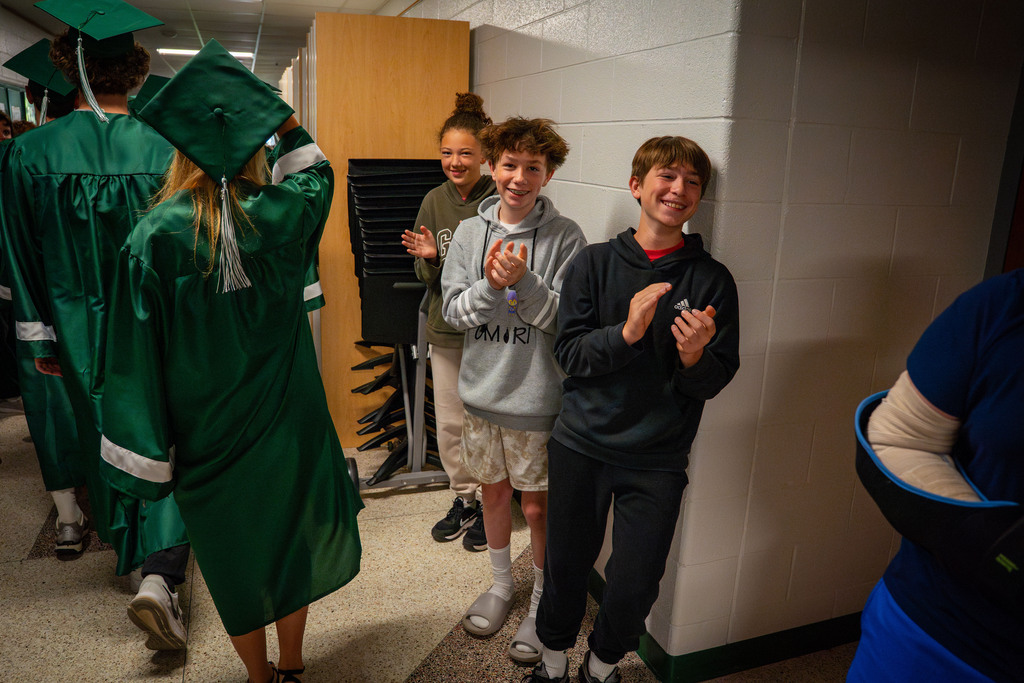 students cheering on seniors