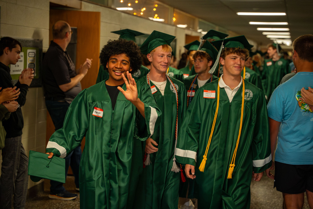 seniors waving to students