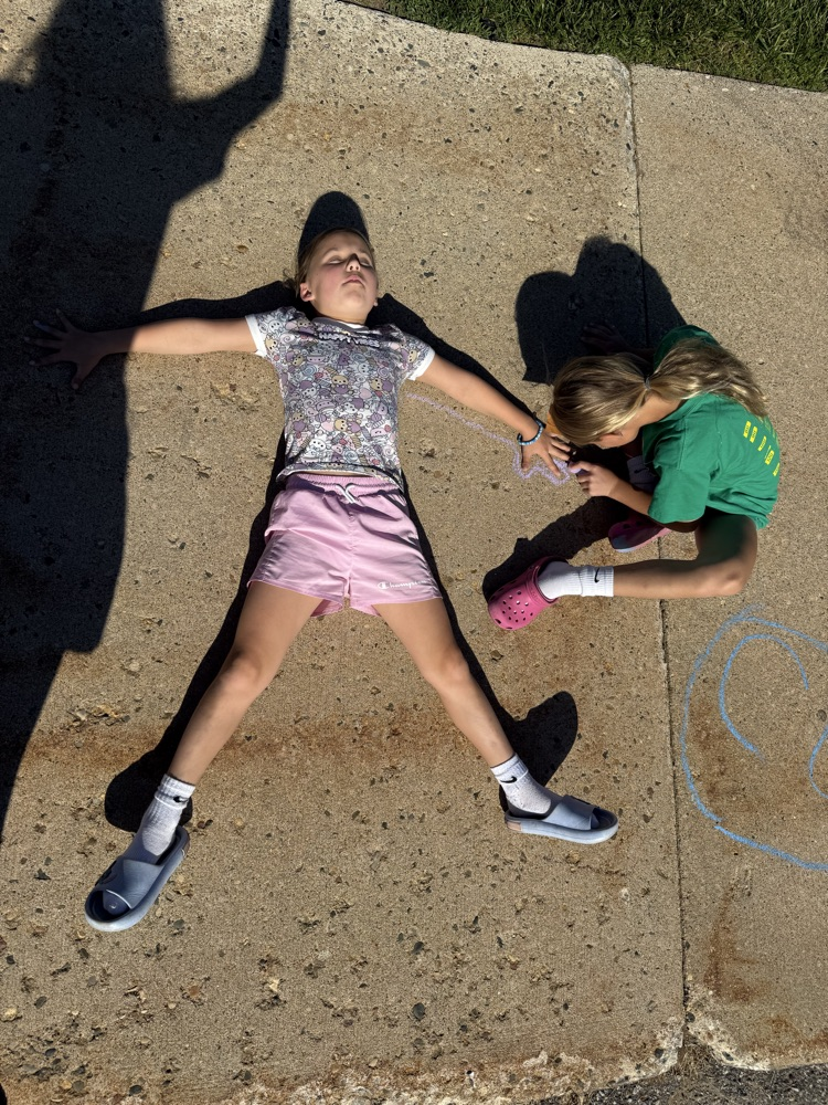 students drawing with chalk