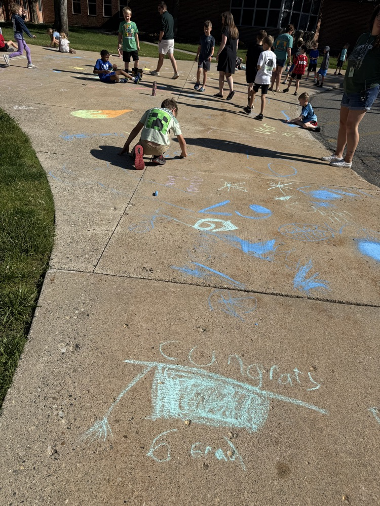 students drawing with chalk