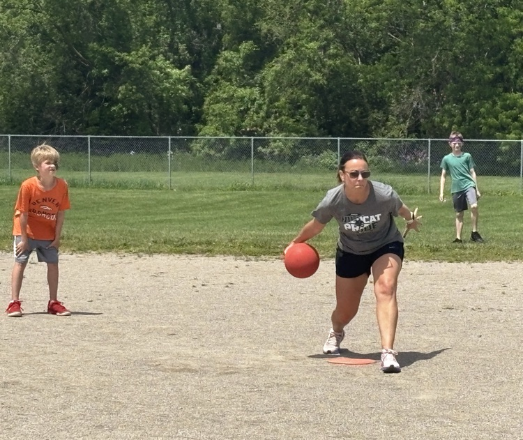 Mrs. Phillips pitching 