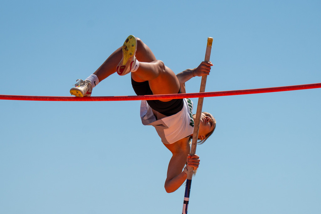 Jenison pole vaulter touching pole