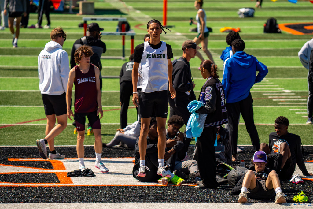 Jenison high jumper jumping to warm up 