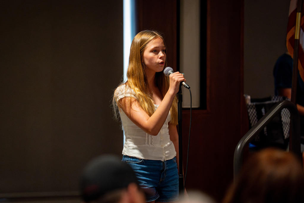 Girls choir member singing