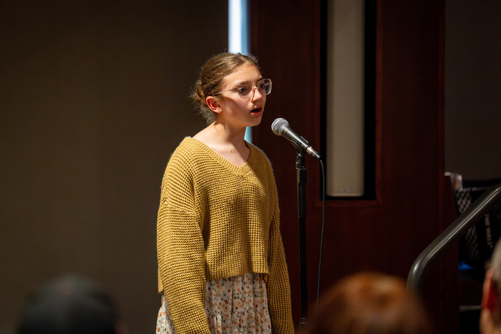 Girls choir member singing