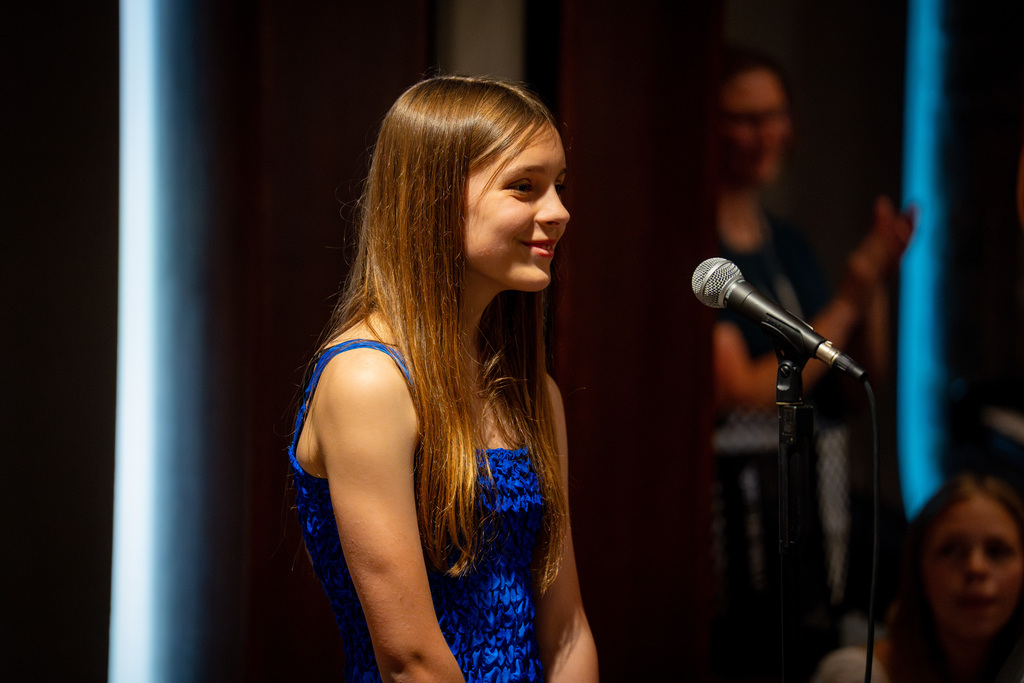 Girls choir member smiling