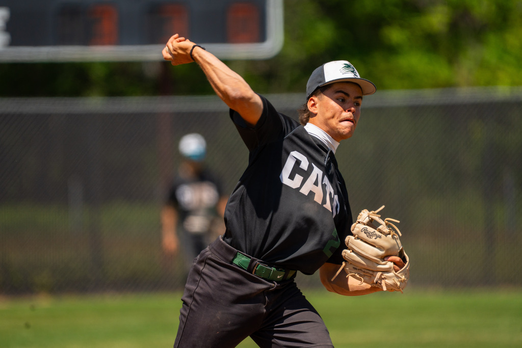 Pitcher throwing to first