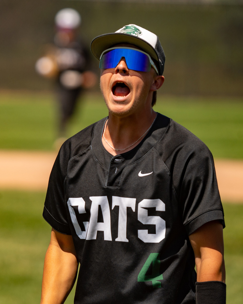 First baseman yelling in elation