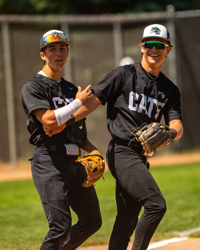 Baseball team members smiling
