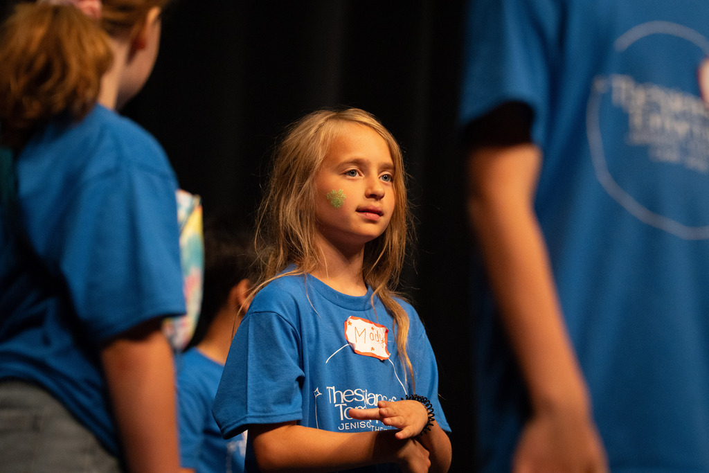 Student at theater camp watching
