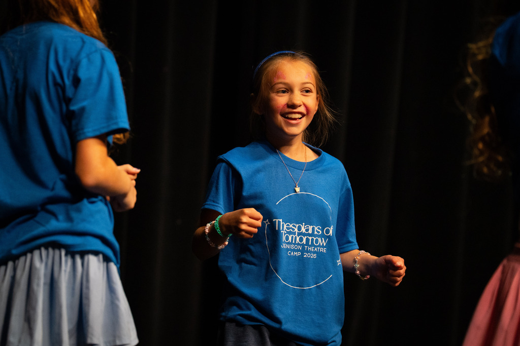 Student at theater camp smiling