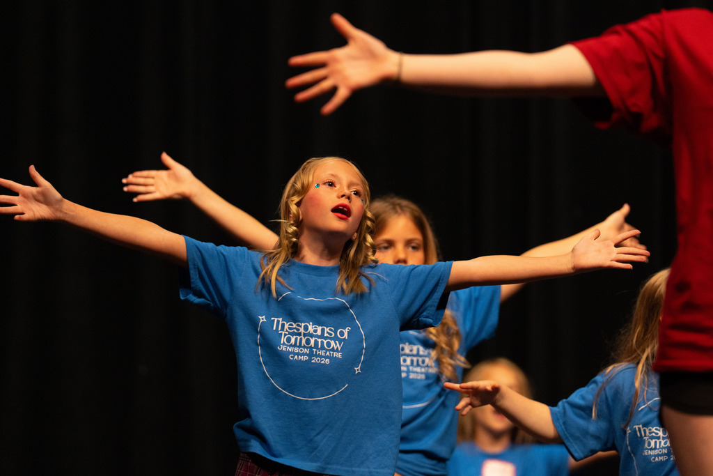 Student at theater camp singing