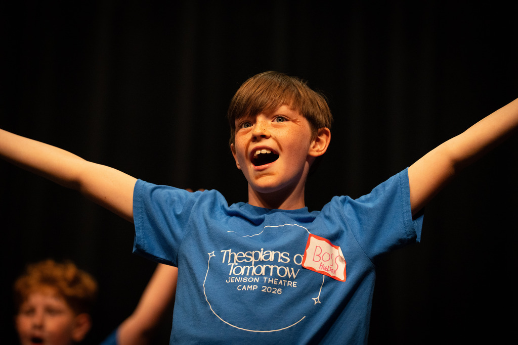 Student at theater camp singing