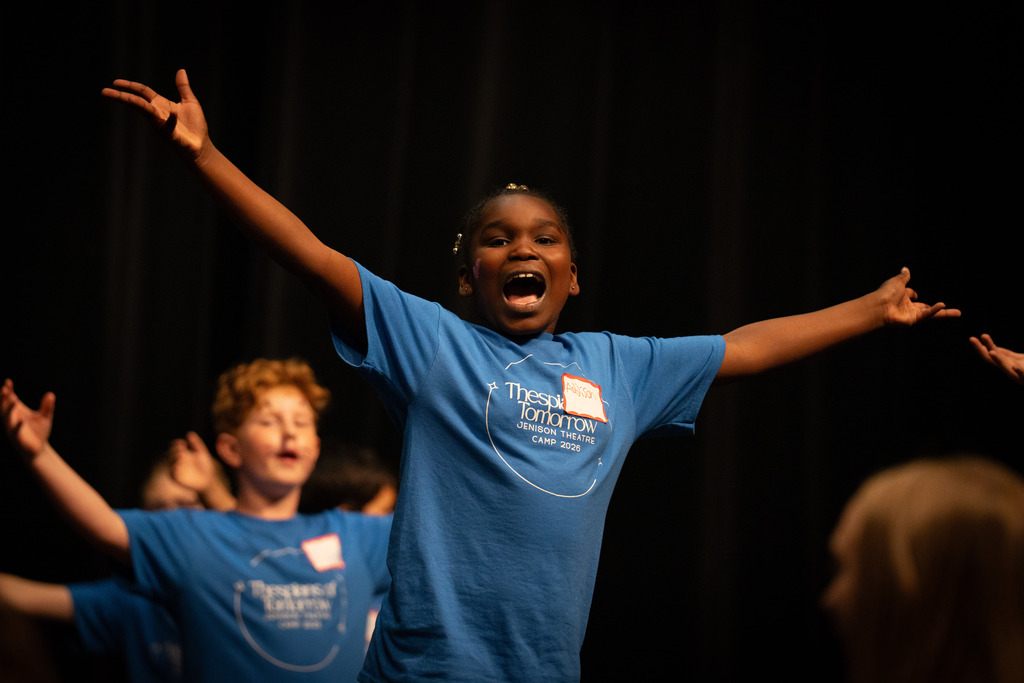 Student at theater camp singing