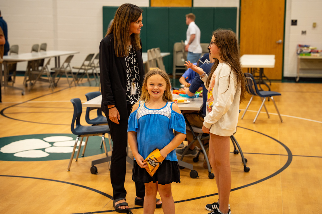 JIA students smiling in gym