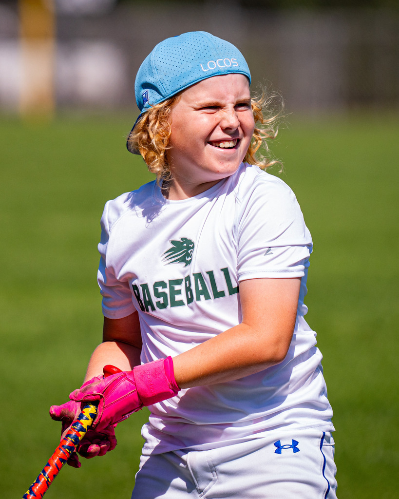 Jenison student smiling on field