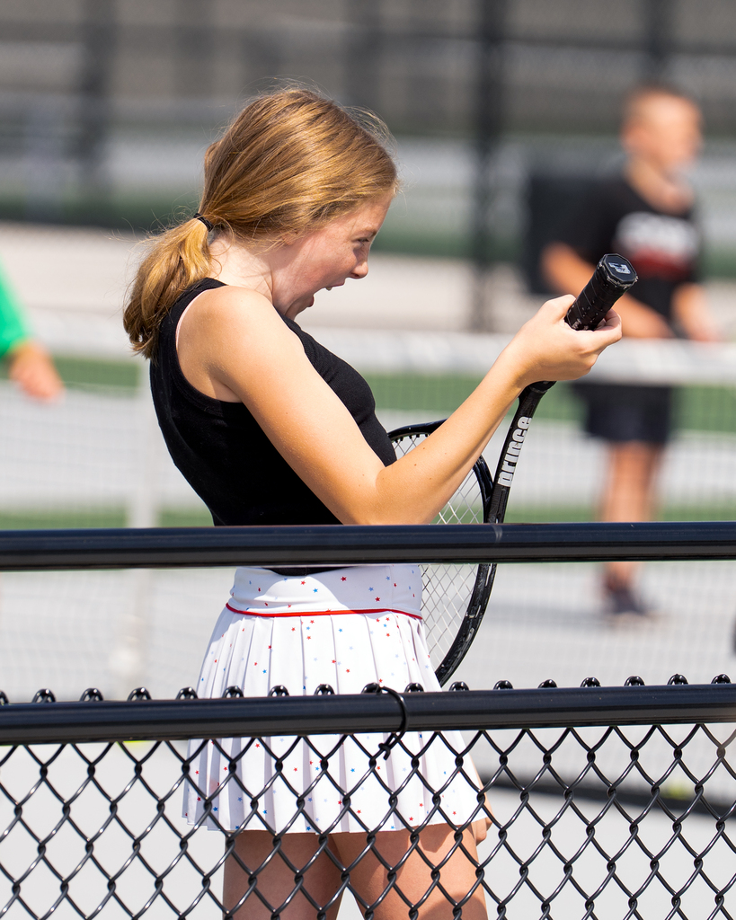 Jenison Tennis camp girl smiling